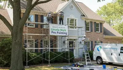 Professional Detroit, MI painters completing a commercial painting project